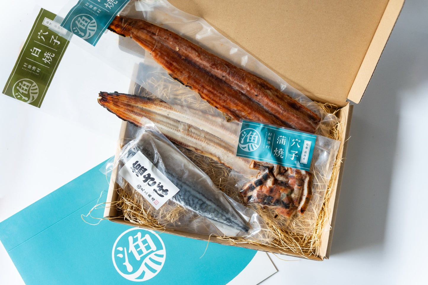 村田漁村の国産真穴子×丸三商品の塩サバ コラボギフト